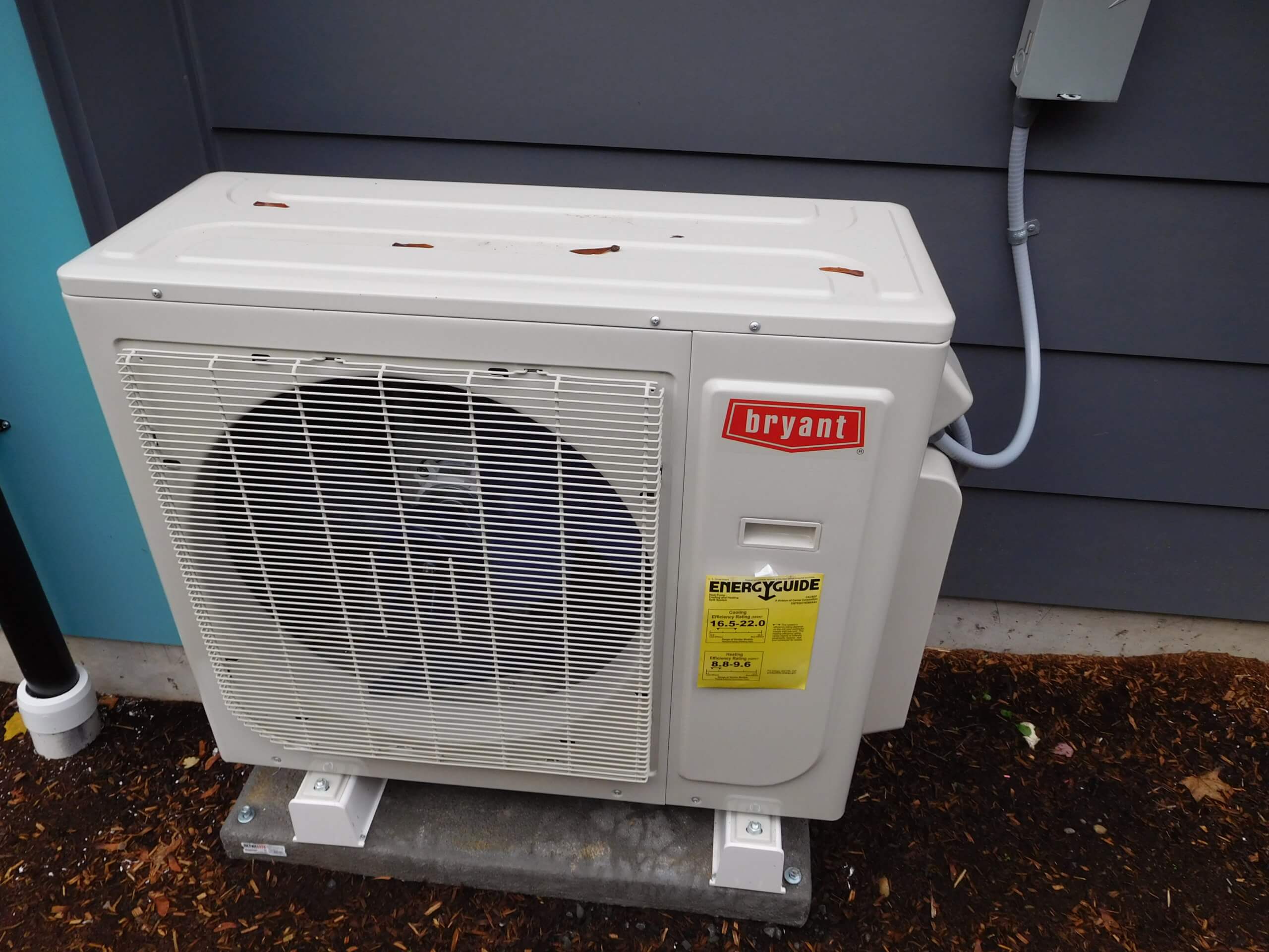 An air conditioning unit on the exterior of the house.